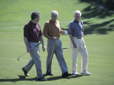Three Senior Men Walking on a Golf Course Photographic Print