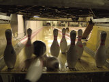 Rear View of Pins Being Struck by a Bowling Ball Photographic Print