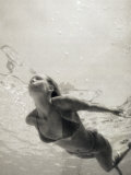 Young Woman Swimming in a Swimming Pool Photographic Print