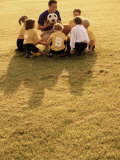 Coach with Youth Soccer Players Photographic Print