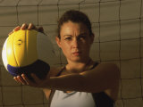 Young Woman Playing Beach Volleyball Photographic Print