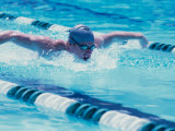 Young Man Swimmer Doing the Butterfly Stroke Photographic Print