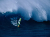 A Windsurfer Riding a Big Wave Photographic Print