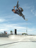 Performing a Bicycle Stunt 写真プリント