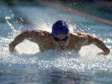 Young Man Swimming the Butterfly Stroke Photographic Print