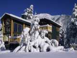Log Cabin Covered in Snow Photographic Print