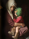 A Woman, 30, Clutches Her 3-Year-Old Daughter Sepgul Photographic Print