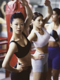 Group of Young Women Exercising in a Gym Photographic Print