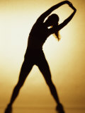 Silhouette of a Woman Exercising - Fotografik Baskı
