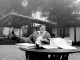 U.S. President Ronald Reagan Shows His Boot Following the Signing of His Tax Bill Photographic Print