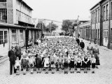 German School Teachers and Children Wear Gas Masks as They are Drilled Photographic Print