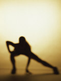 Silhouette of a Woman Exercising - Fotografik Baskı