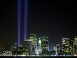 The Twin Lights Memorial Rises Above the New York City Skyline from the Waterfront Photographic Print
