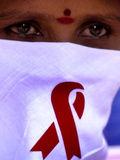 A Sex Worker Looks on During an Aids Awareness Rally on World Aids Day Lámina fotográfica A Sex Worker Looks on During an Aids Awareness Rally on World Aids Day Lámina fotográfica