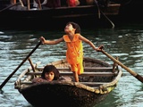 Sisters Who Live with Their Family on Halong Bay, Vietnam, Row Their Boat out to Greet Tourists Photographic Print