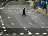 An Orthodox Israeli Jew Walks Across an Empty Road During the Sabbath Photographic Print