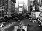 Visitors and Residents of New York City Spend Their Time Window-Shopping Around the Times Square Photographic Print