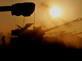 An Israeli Soldier Runs to Reload an Israeli Mobile Artillery Piece Photographic Print