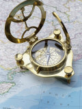 Compass on a Map Photographic Print