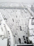 Snow Covers the Railroad Tracks at the Westside Railyard as Snow Falls on New York Photographic Print
