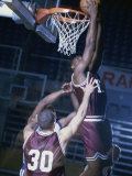 Basketball Player Slam Dunking Photographic Print
