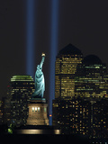 Lights from the Former World Trade Center Site Can be Seen on Both Sides of the Statue of Liberty Photographic Print