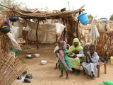 A Sudanese Family is Seen Inside Their Thatched Hut During the Visit of Unicef Goodwill Ambassador Photographie