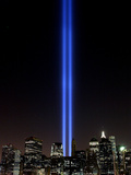 The Tribute of Light Memorial Shines into the Sky Over the Night Skyline of New York City Photographic Print