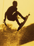 Silhouette of a Man Wakeboarding Photographic Print