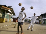 Children Play Soccer on a Street Photographic Print