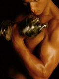 Young Man Exercising with Dumbbells Photographic Print