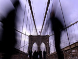 People Make Their Way Across the Brooklyn Bridge During the Evening Rush Photographic Print