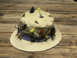 Fishing Hat Covered with Fishing Lures Photographie