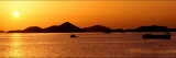 A Tug-Boat Pulls a Barge Along at Sunset as Seen from St. John Photographic Print