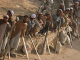 A Group of Afghan Construction Daily Workers Wait to be Hired Photographic Print