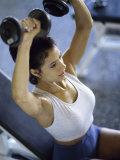 Young Woman Exercising with Dumbbells Photographic Print