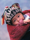 Miao Baby Wearing Traditional Hat, China Photographie par Keren Su