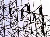 Workers Assemble the Frame of an Advertising Billboard Alongside a Bangkok Expressway Photographic Print