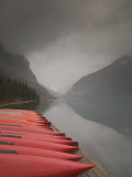 Red Canoes on Lake Louise, Banff National Park, Alberta, Canada Photographic Print by Walter Bibikow