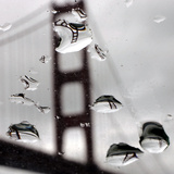 Rain Drops are Shown on a Car Windshield with the Golden Gate Bridge in Background Photographic Print
