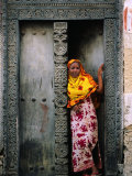 Swahili Girl in Zanzibar Doorway, Bagamoyo, Tanzania Photographic Print by Ariadne Van Zandbergen