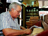 Cigar Roller at Work, Tampa, U.S.A. Photographic Print by Oliver Strewe