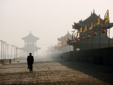 Man Walking on Ancient Wall Near North Gate, Xi'An, China Photographic Print by Greg Elms
