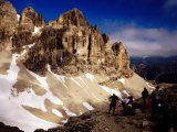 Hikers Resting at Bamberger Saddle, Gruppo Sella, Dolomites, Italy Photographic Print by Witold Skrypczak