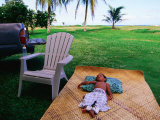 Boy Sleeping Outside Vaoto Lodge, Manua'a Islands, American Samoa Photographie par Peter Hendrie