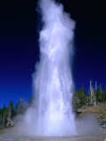 Water Spouting from Grand Geyser, Yellowstone National Park, USA Photographie par Carol Polich