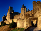 Tourists Enter Medieval Walled City at Sundown Via Porte D'Aude, Carcassonne, France Photographic Print by Dallas Stribley
