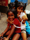 Portrait of Children Sitting on Motorbike, Chowringee, India Photographie par Anthony Plummer