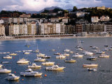 Boats and Waterfront Buildings at Playa De La Concha, San Sebastian, Spain Photographic Print by Dallas Stribley
