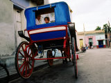 Girl in Horse-Drawn Carriage Taxi, Parque Cespedes, Bayamo, Cuba Photographic Print by Christopher P Baker